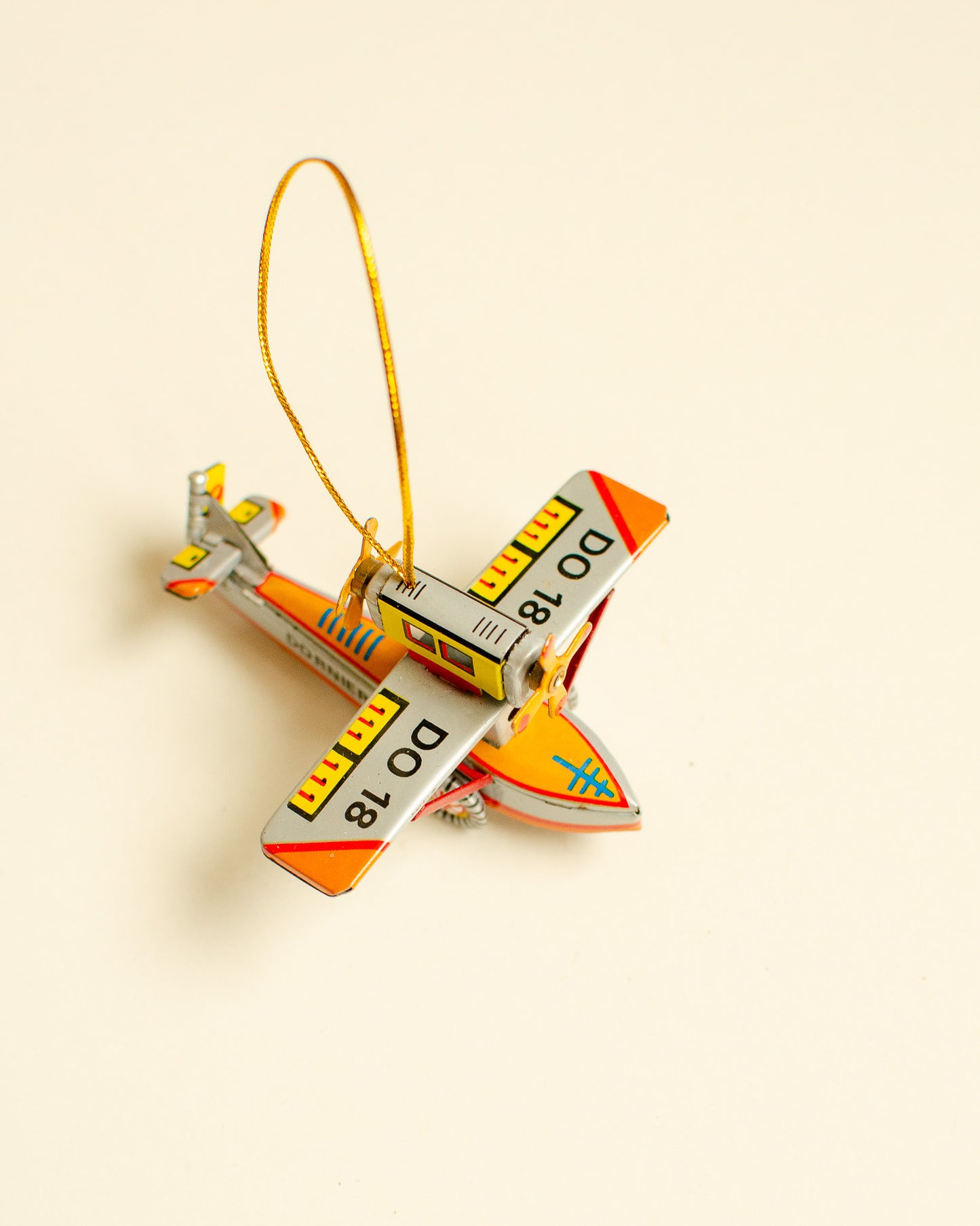 Aqua Plane Tin Ornament