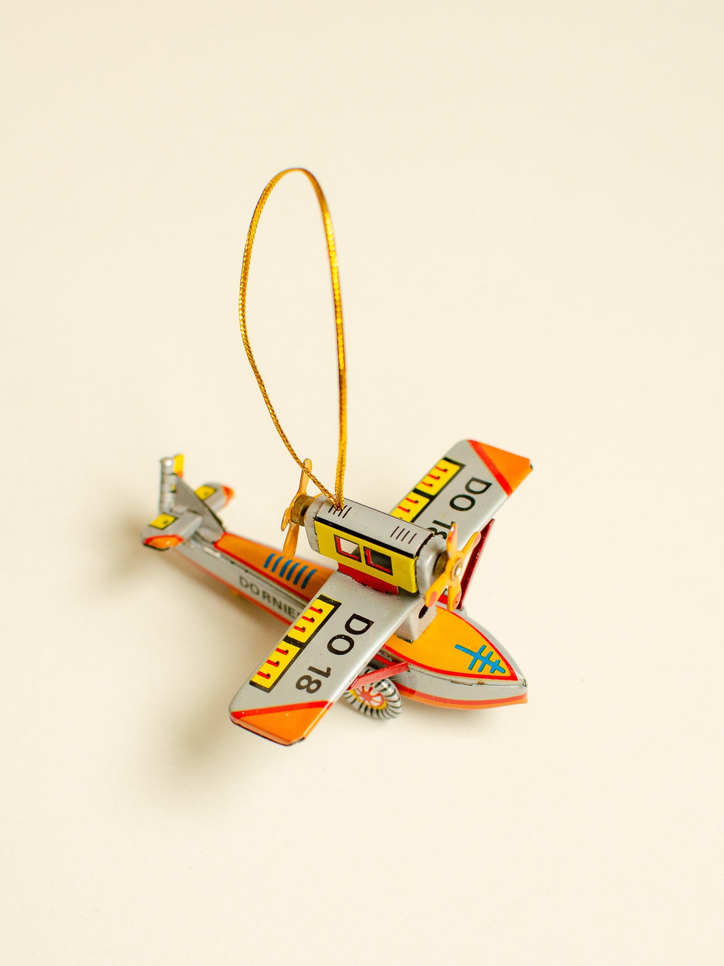 Aqua Plane Tin Ornament