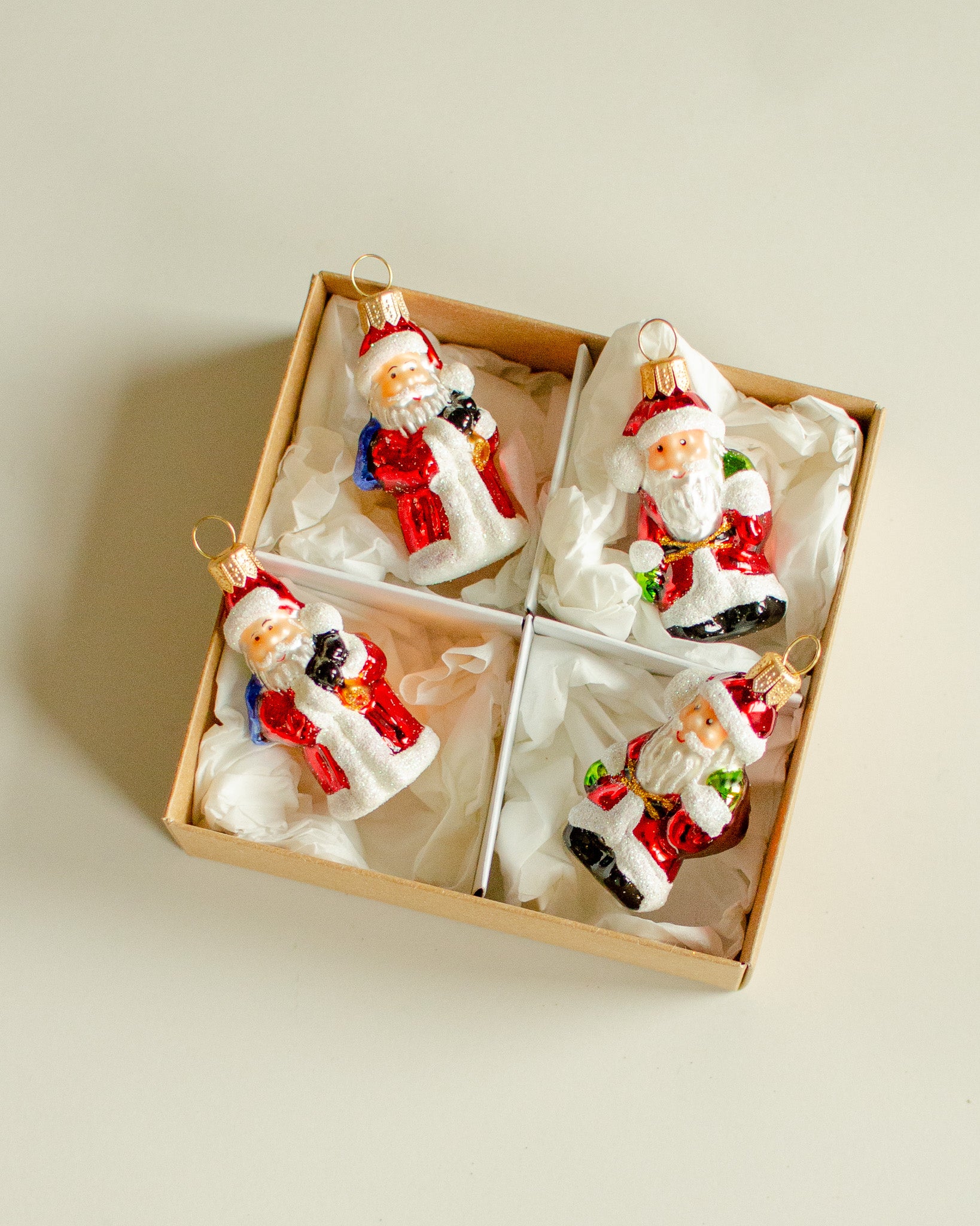 Santa with Gifts Ornament set of 4 - green and blue mix