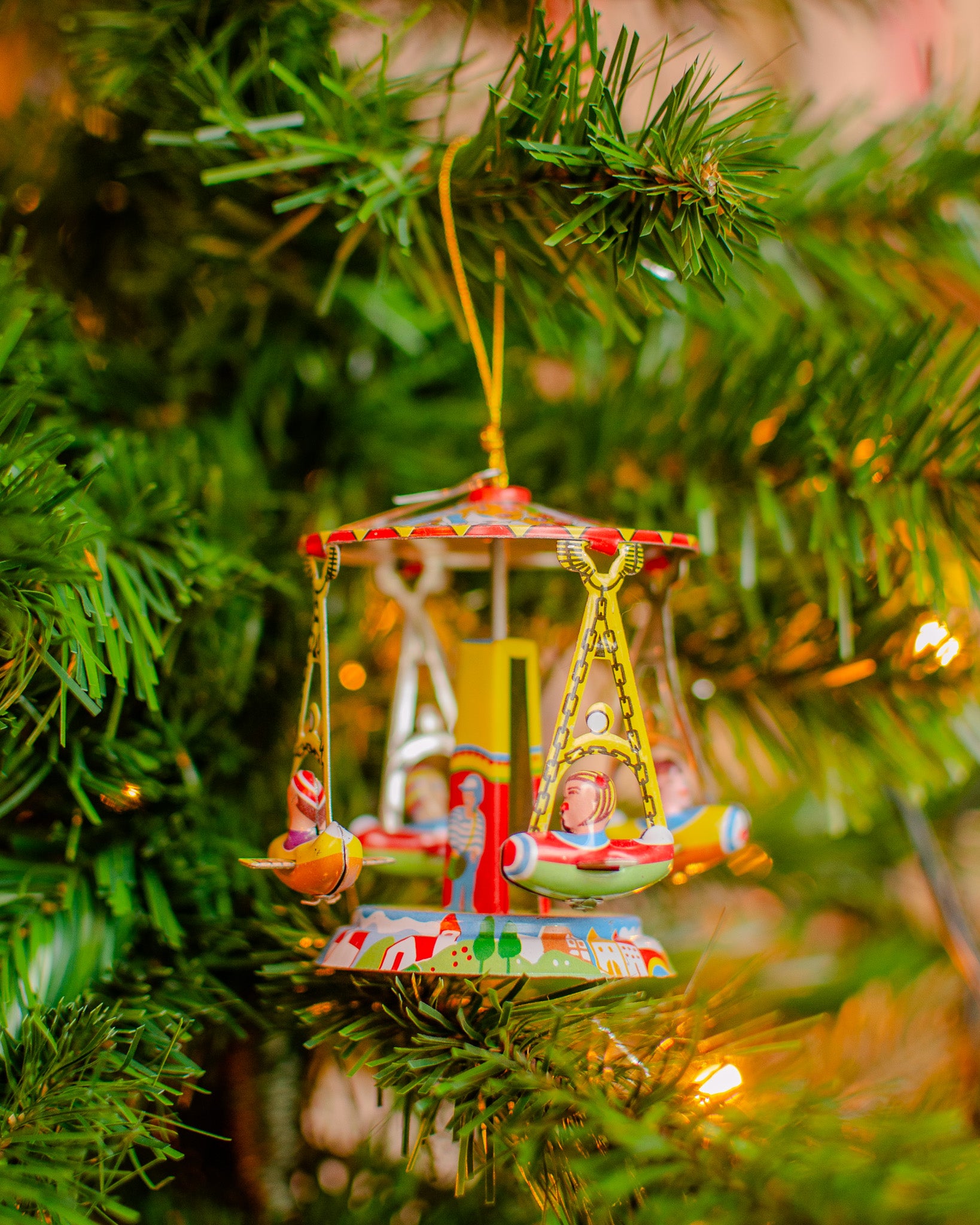 Carousel with Airplanes Tin Ornament
