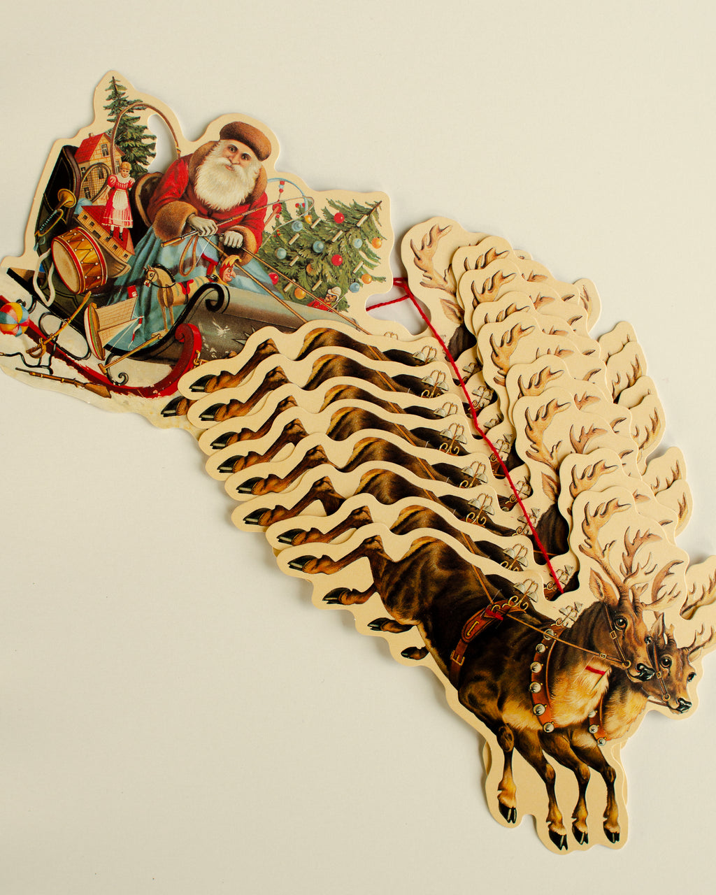 Santa in sleigh Guirlande